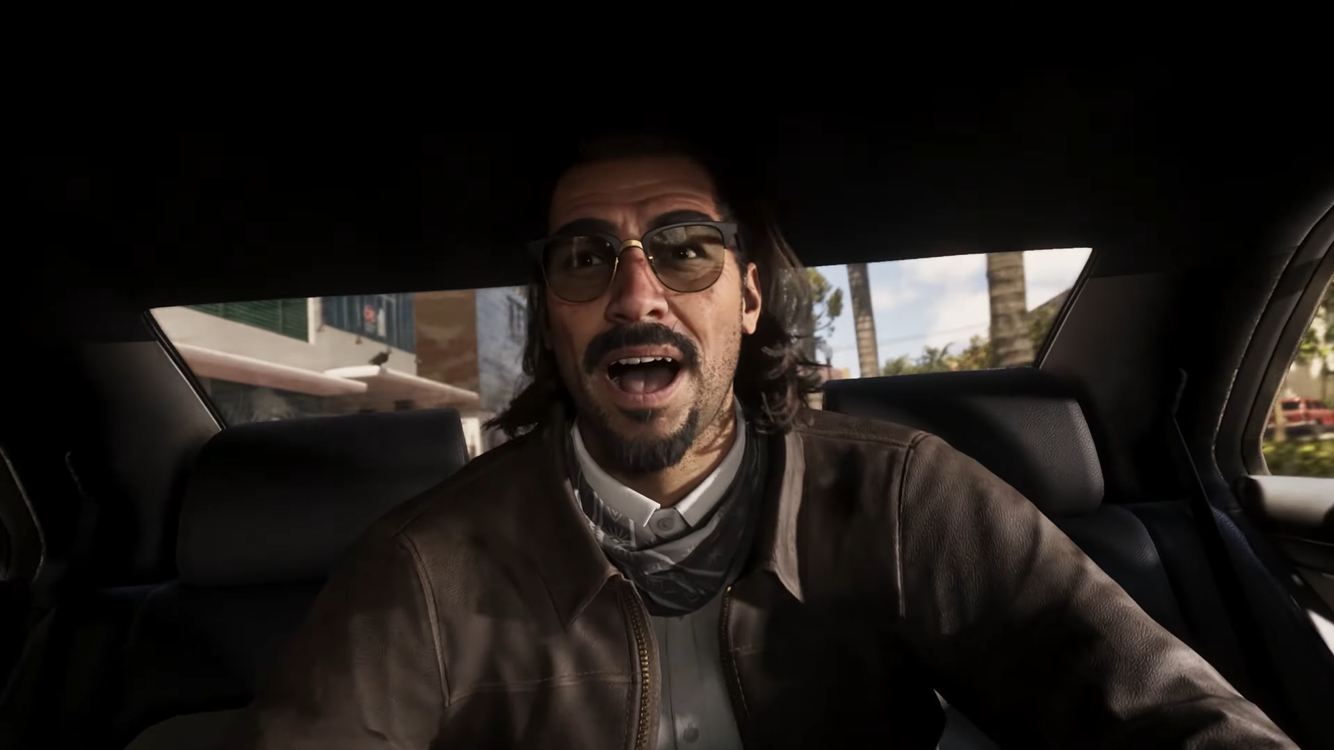 Raul in the getaway car with Jason and Lucia during the police chase scene